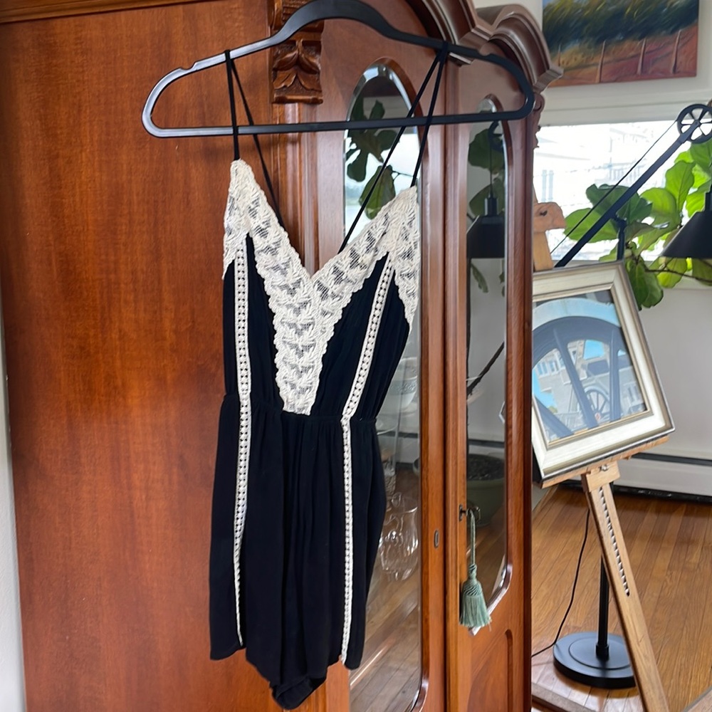 Black romper with lace detail